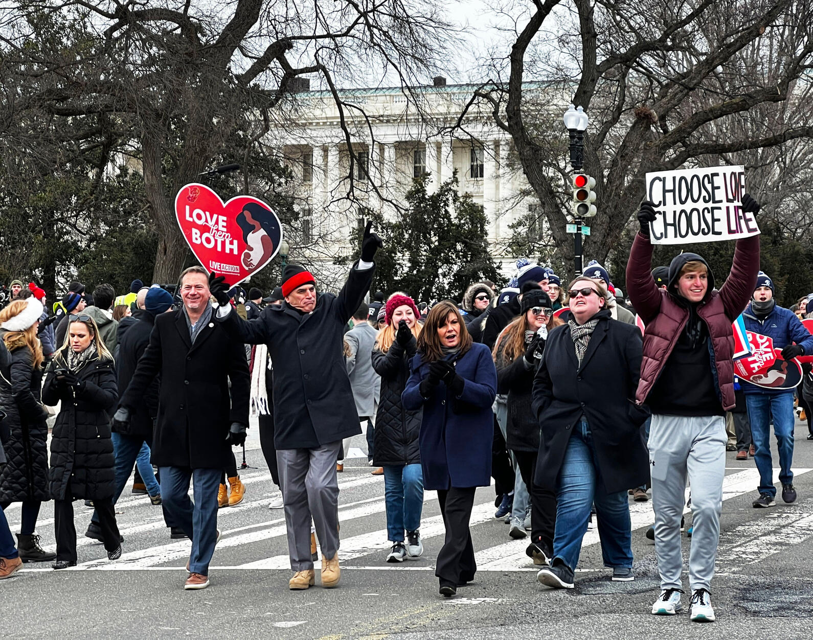 Marchers Holding Signs